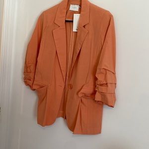 Peach colored cloth blazer